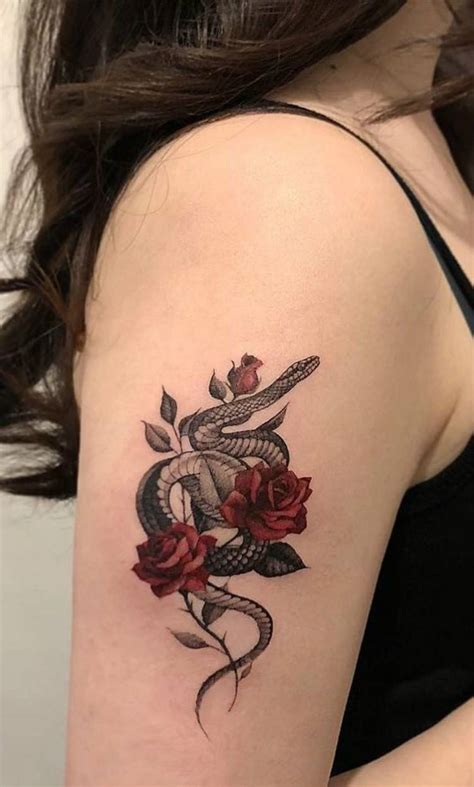 snake tattoo on arm girl.